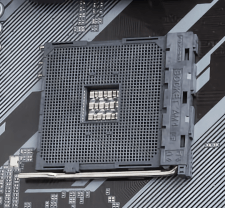 An AM4 ZIF socket on a Gigabyte motherboard with the lever on the bottom edge of the socket
